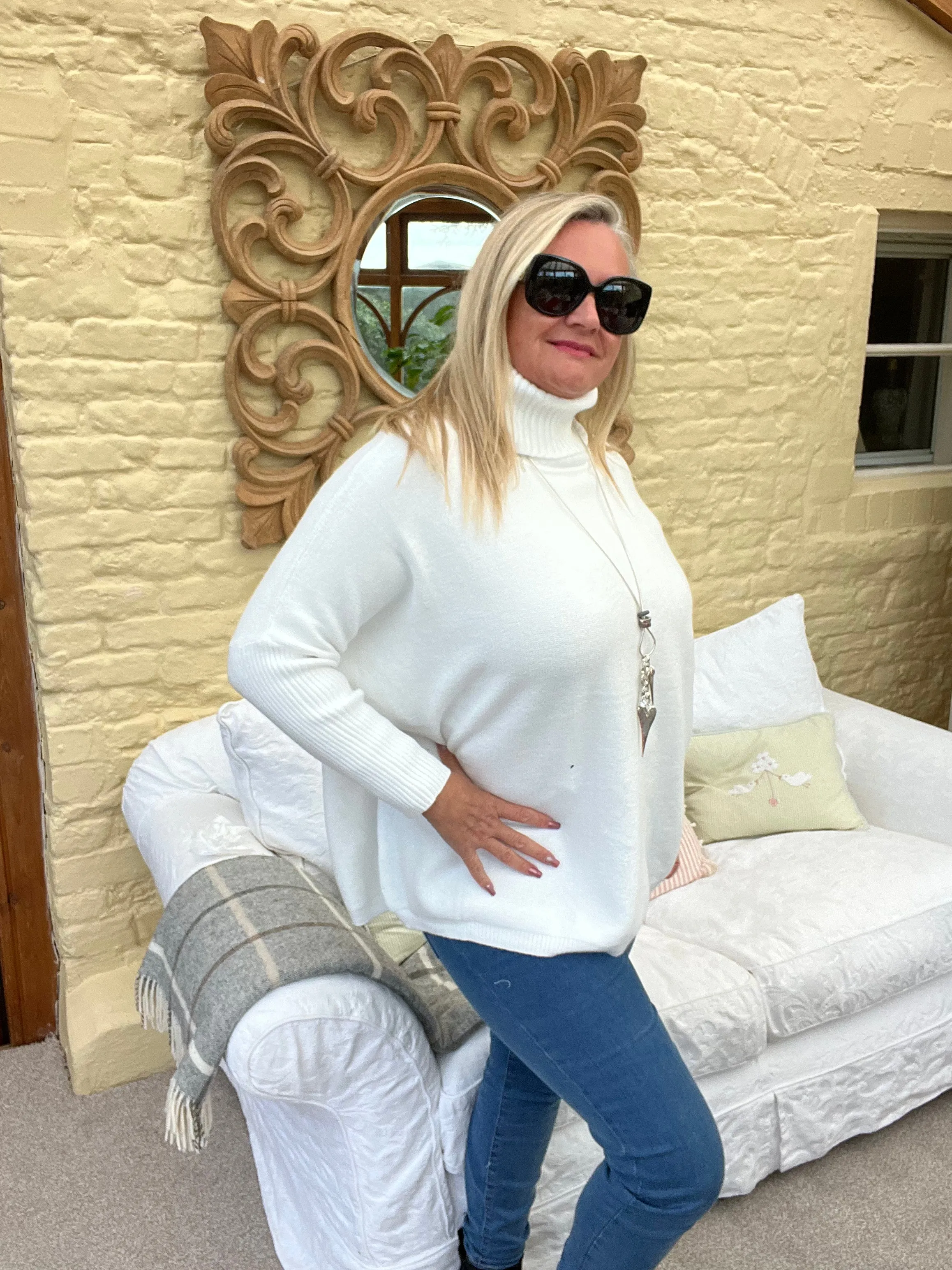 Rolled Neck Relaxed Style Jumper In Winter Cream